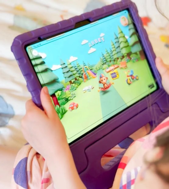 A child holding a tablet running Meevee